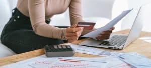 Woman reviewing her bills.